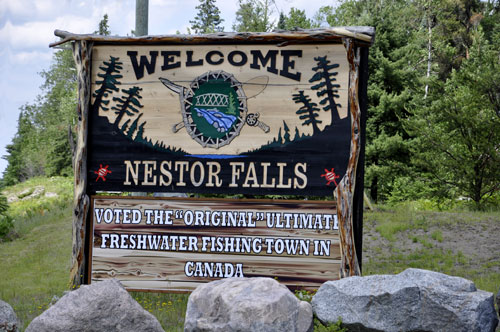 Welcome to Nestor Falls sign